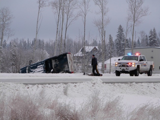 RCMP officer stands over handcuffed suspect following police pursuit Saturday morning. Photos 250News