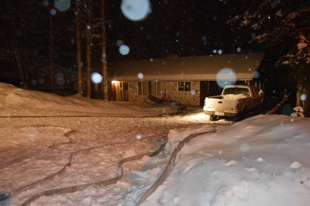 Fire spread to a rear corner of this house on Poyner Crescent in the Hart. Photos 250News