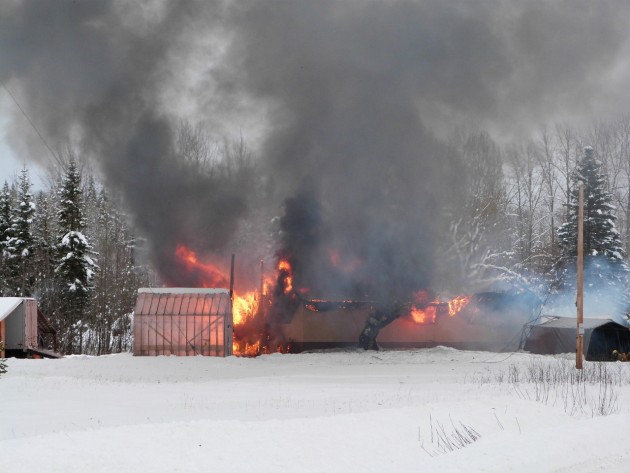 Fire raced through and consumed a Salmon Valley home on Saturday. Photo 250News