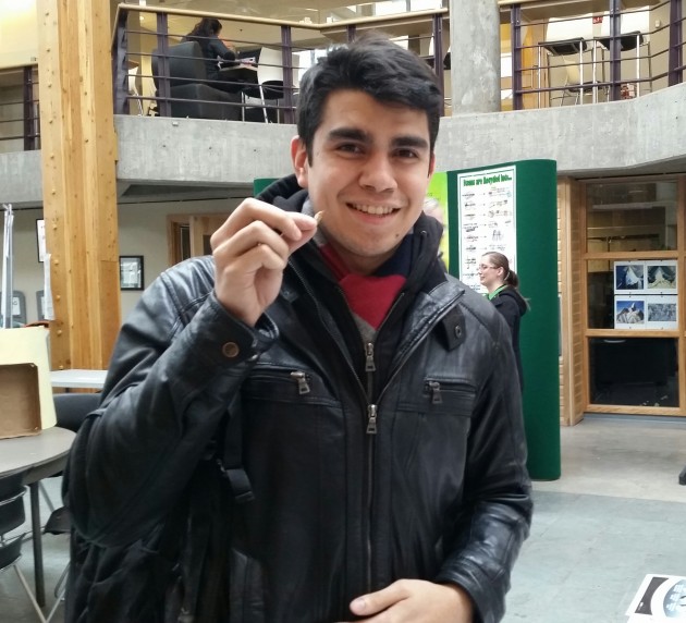UNBC student Gerson Larios gets set to try his very first cricket - photos 250News