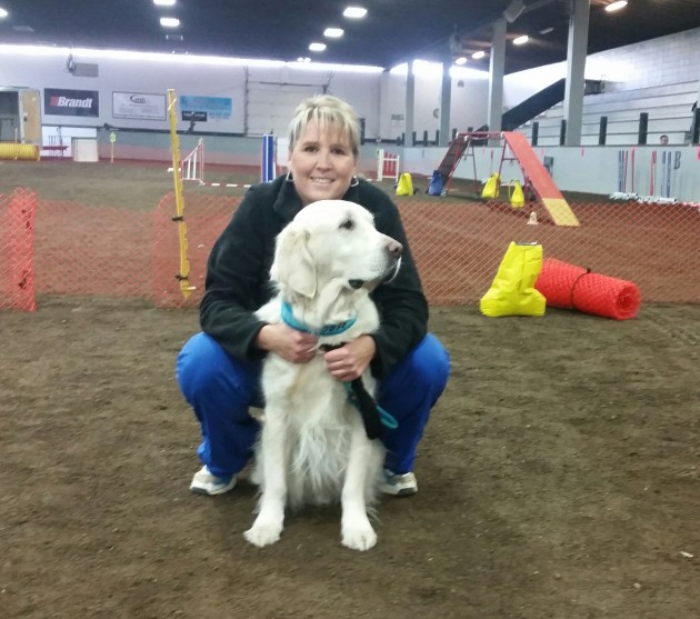 Sheri Grantham and Reggie, her Golden Retriever - photo 250News