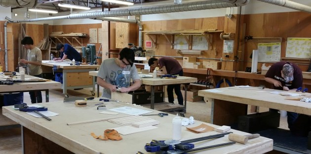 Students work on a cabinetry project today at CNC - photos 250News