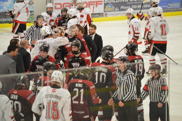 Goalies Dorrin Luding and Beck Warm meet at centre ice after Cariboo Cougars capture BCMML semi-final series. Photo 250 News