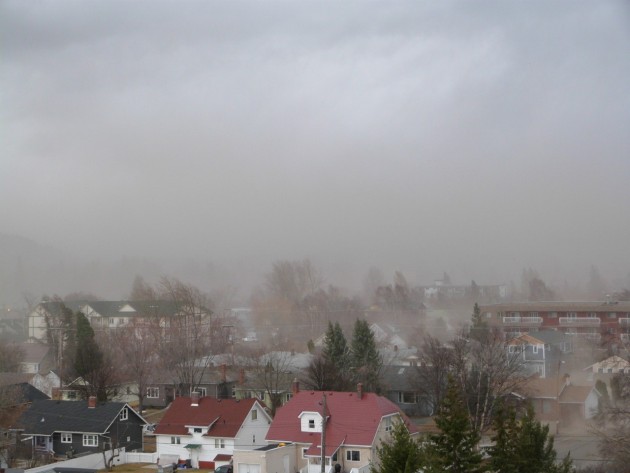 The wind whipped a massive dust cloud through the bowl around 3:30 Saturday afternoon. Photo 250 News