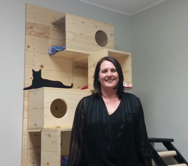 PG Humane Society Executive Director Angela Lotz in one of the cat adoption rooms - 250News