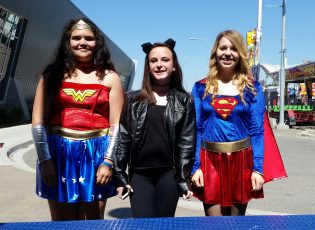 From left, Wonder Woman, Cat Woman and Super Girl