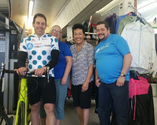 From left, Frank Lucarelli, owner, Spruce land Shoppers Drug Mart, Maurer Davis, executive director, Canadian Mental Health Association, PG Branch, Sherry Ogasawara, spokesperson, 'Ride Don't Hide, Devin Sluchinski