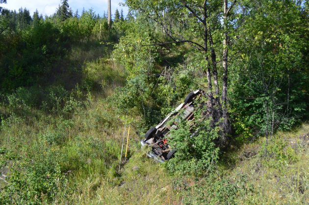 Truck lays on its roof after going over embankment off North Nechako Road Sunday afternoon. Photos 250News