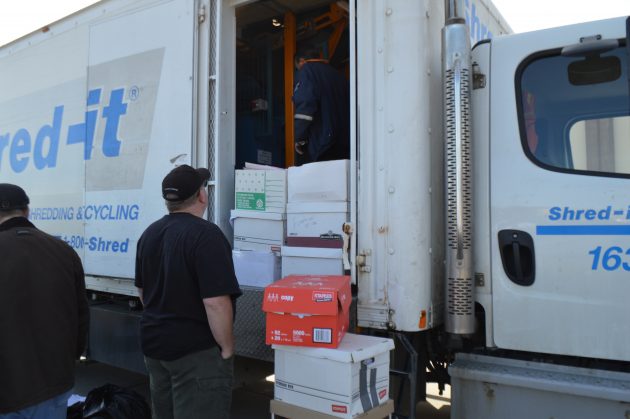 Randy (in truck) operates mobile shredding unit outside Walmart on Saturday. Photo 250News