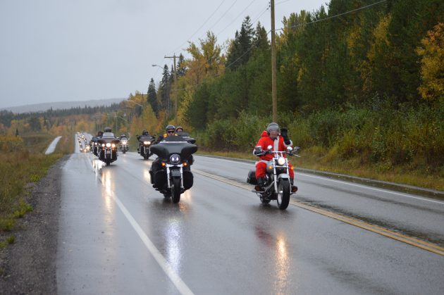 Santa leads procession of 158 motorcycles up Tyner Boulevard on Prince George Toy Run. Photo 250News