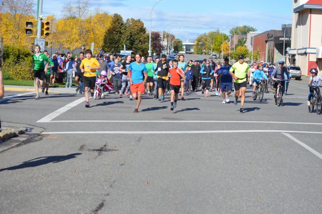 Participants leave 7th and Dominion at the start of Sunday's Terry Fox Run.
