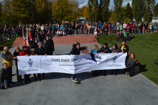 Brad King breaks the banner officially opening the Hart skateboard park. Photo 250News