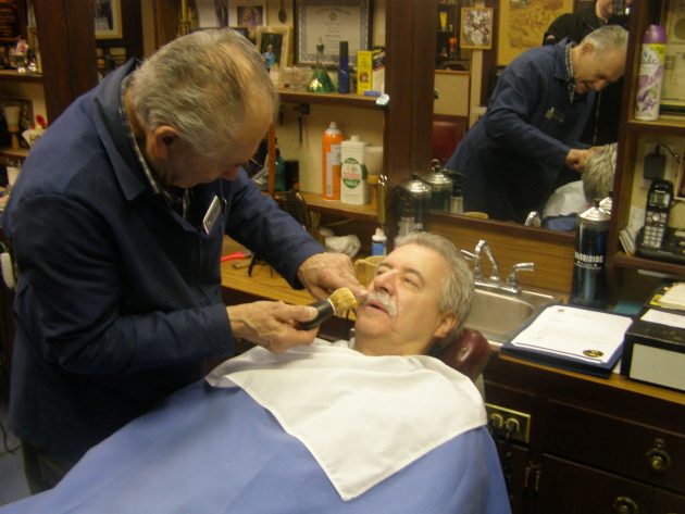 'George the Barber' Blanis shaves off Prince George Mayor Lyn Hall's moustache Thursday morning - photo 250News